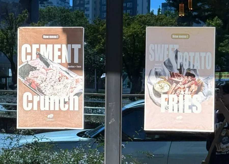 Menu and standing sign outside the restaurant