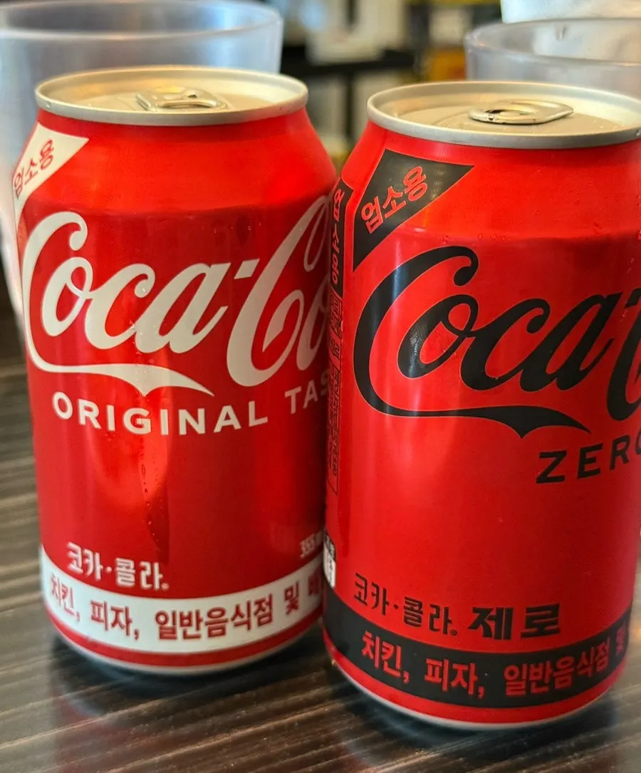 Two glasses of soda with ice