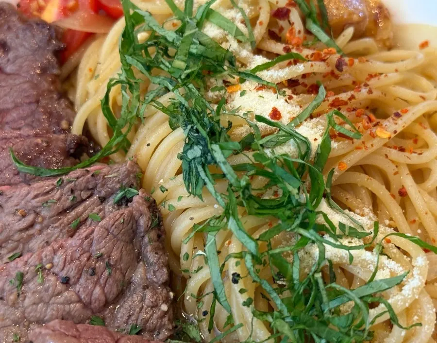 Oil pasta topped with julienned perilla leaf
