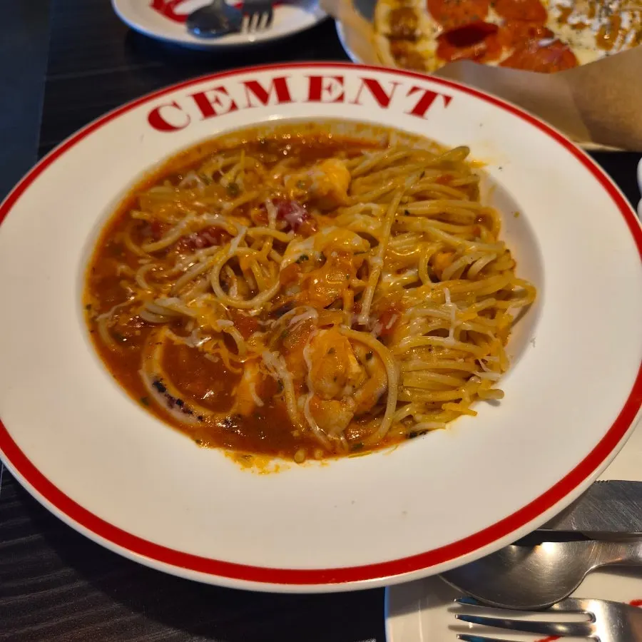 Spicy tomato pasta with squid and shrimp