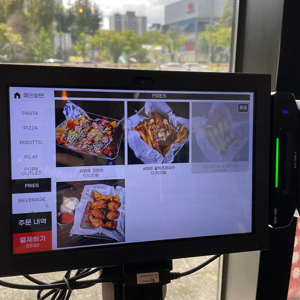 Table with the tablet ordering screen on