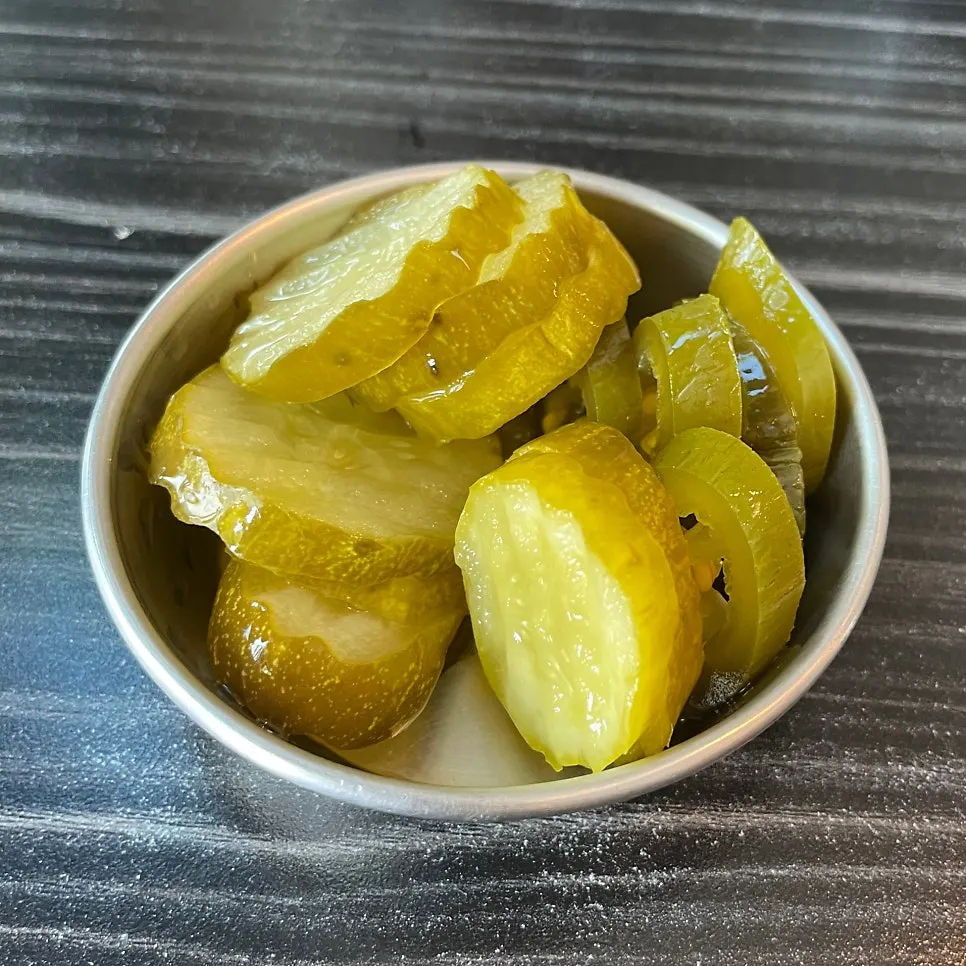 Pickles and sauces brought over from the self-serve corner