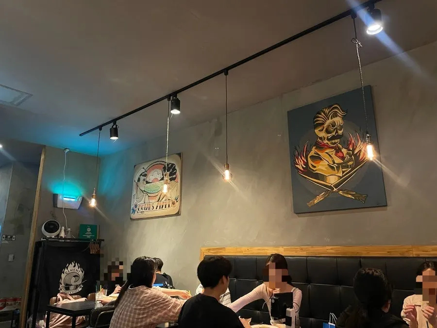 Interior decorated with posters and small decor items