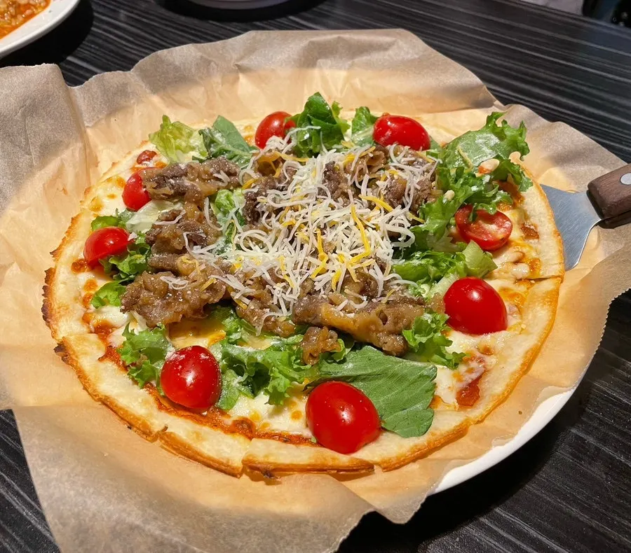 A whole bulgogi salad pizza
