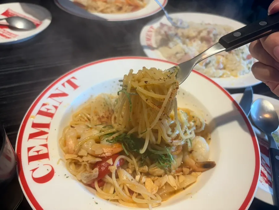 Close-up of shrimp oil pasta topped with shrimp