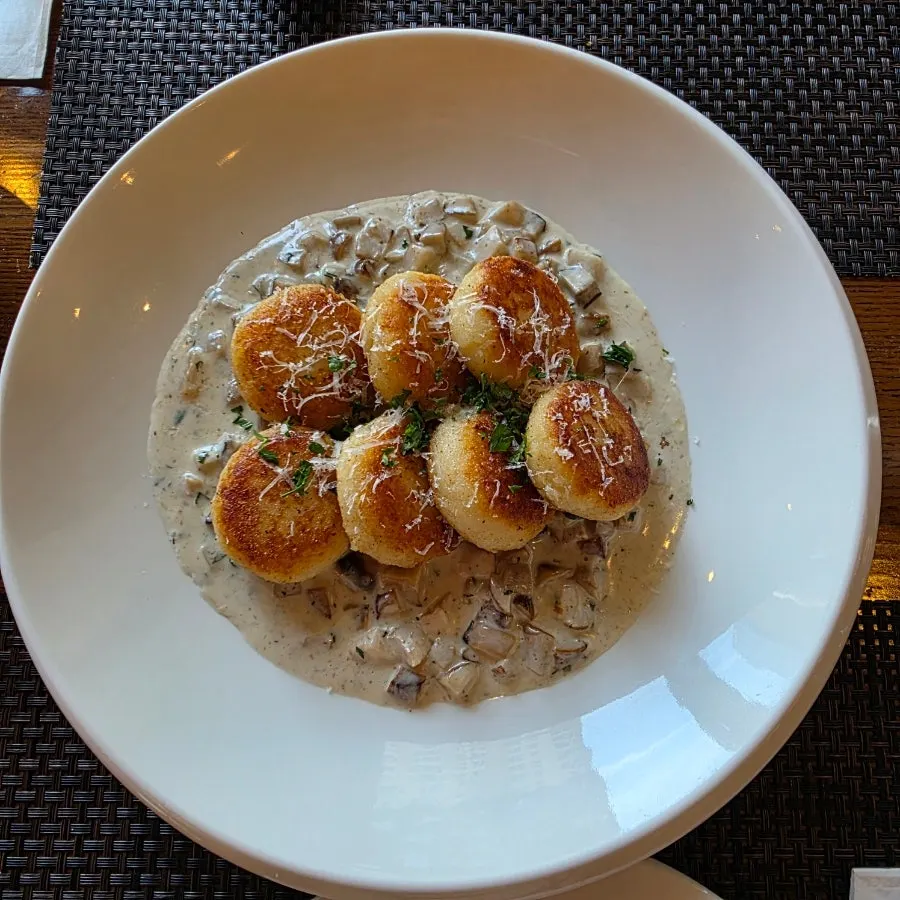 Mushroom cream gnocchi being served at Cenacolo Artfore