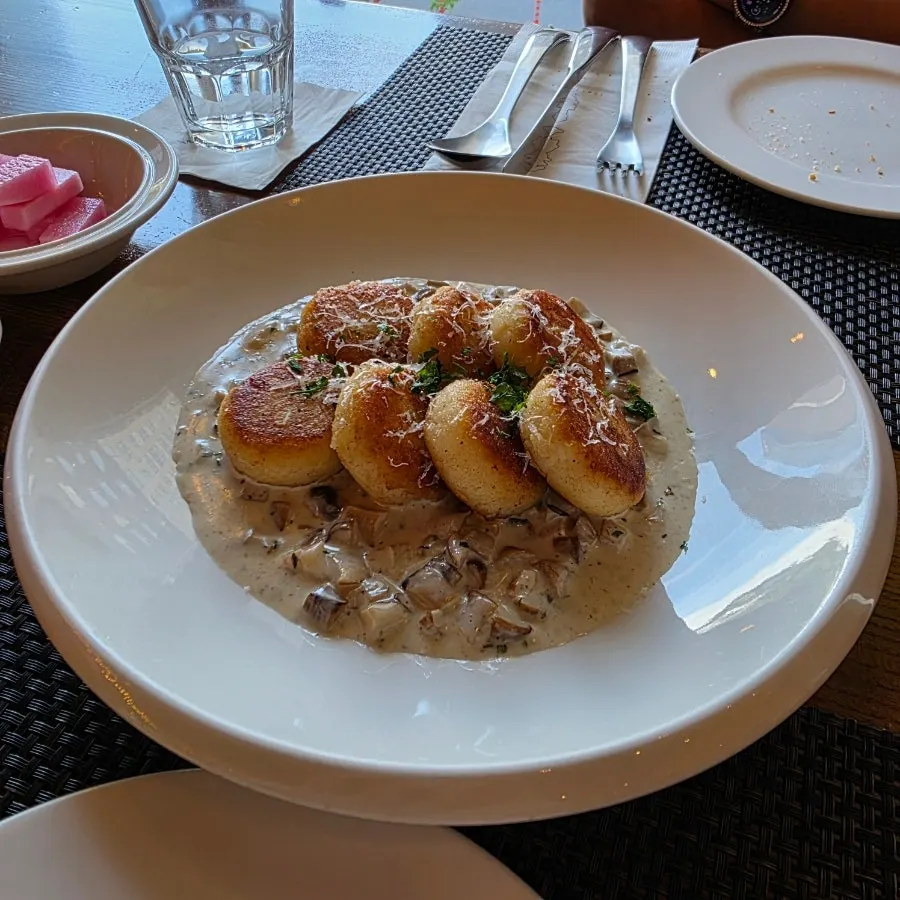 Full plate of mushroom cream gnocchi