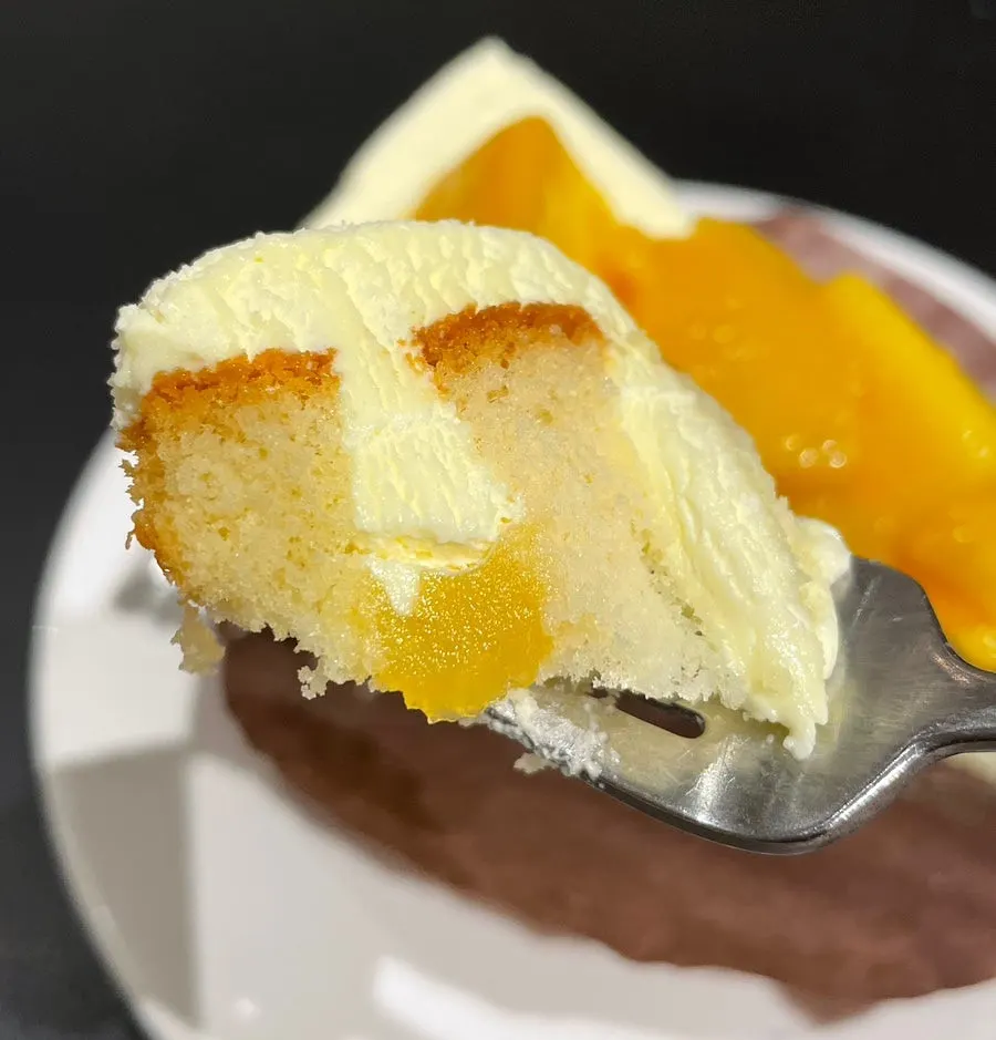 Cross-section of the cake showing mango filling