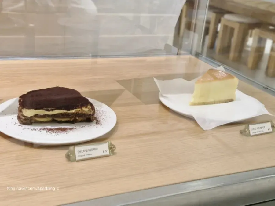 Original tiramisu and Chicago cheesecake in the display case