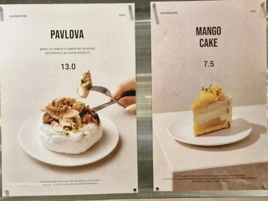 Pavlova and mango cake in the display case
