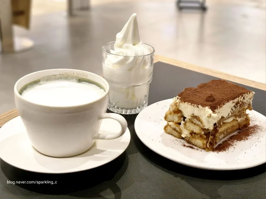 Drinks and dessert served on a wooden tray