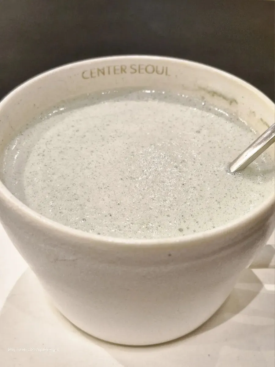 Mugwort latte cup with whipped cream mixed in