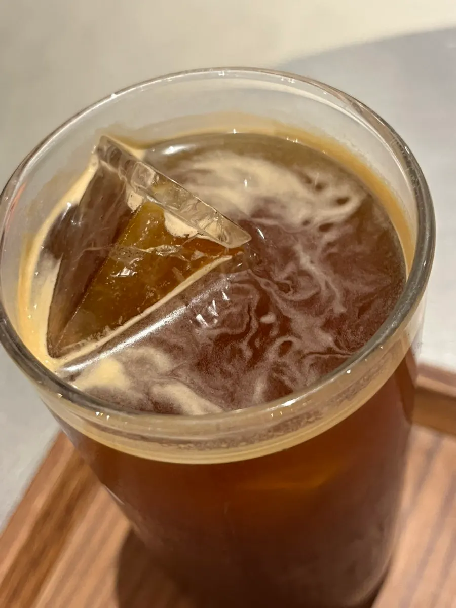 Close-up of the vividly colored plum omija tea