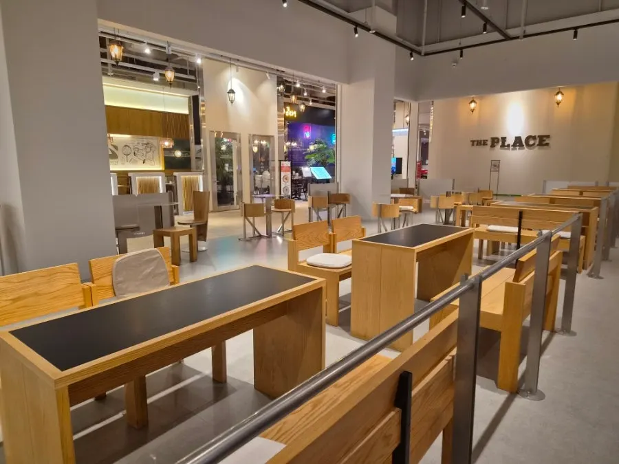 Wide, open seating area inside Center Coffee