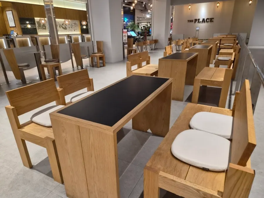 Square wooden chairs and tables