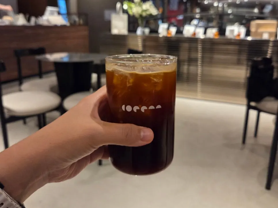 Two iced americanos in clear glass cups