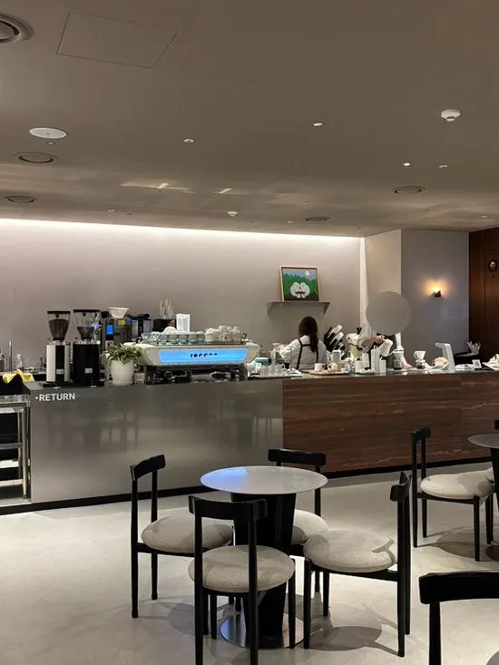 Interior of Center Coffee Gwanghwamun with wood-tone design