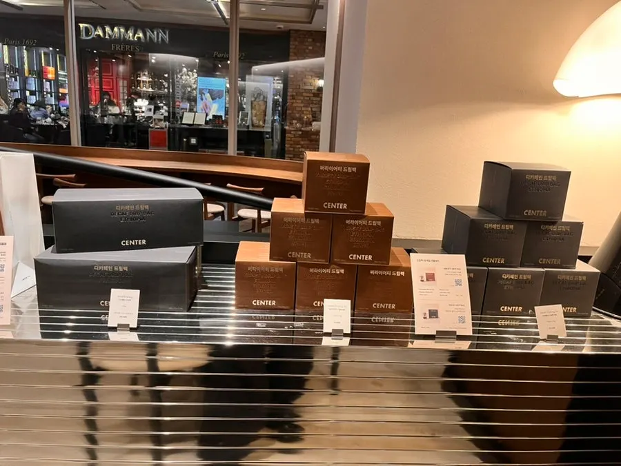 Display of home-café cups and coffee goods