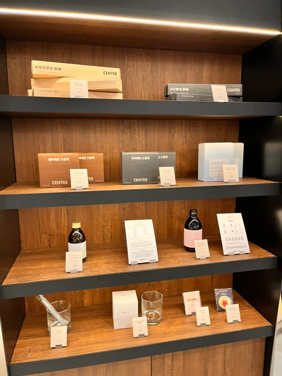 Shelf displaying Center Coffee drip-bag products