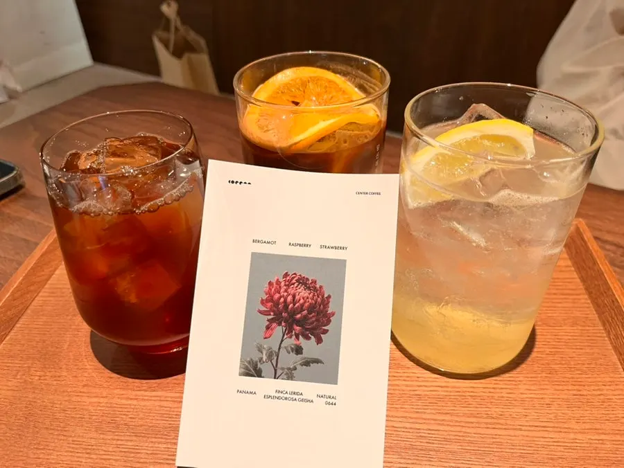 A cup of Panama Geisha Natural with its description card