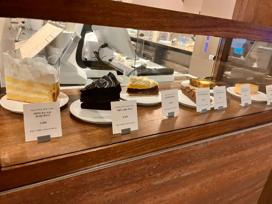 Dessert showcase filled with cakes and baked goods