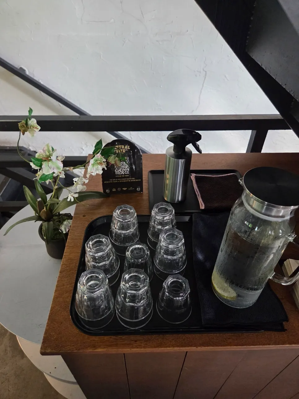 A cool glass of lemon water served
