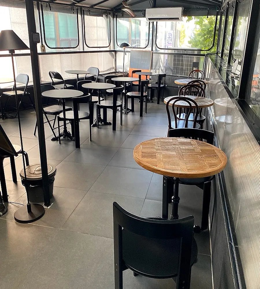 3rd floor seating with black-and-wood interior
