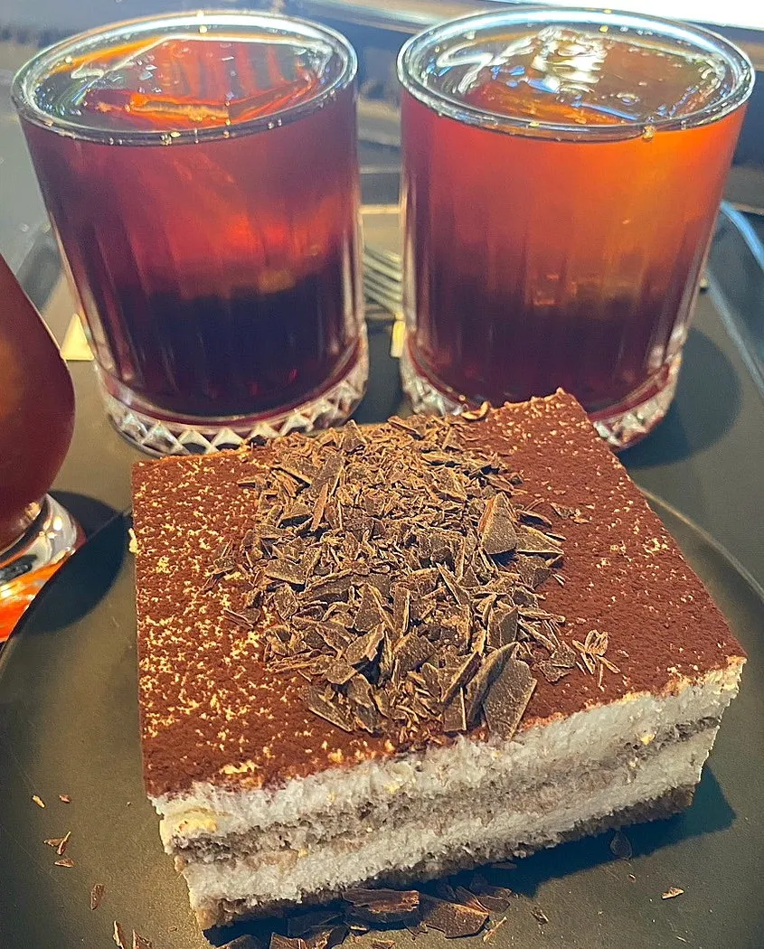 Tiramisu paired with iced brewing coffee