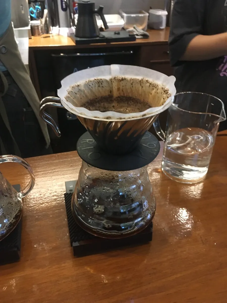 Hand-drip coffee poured into a cup