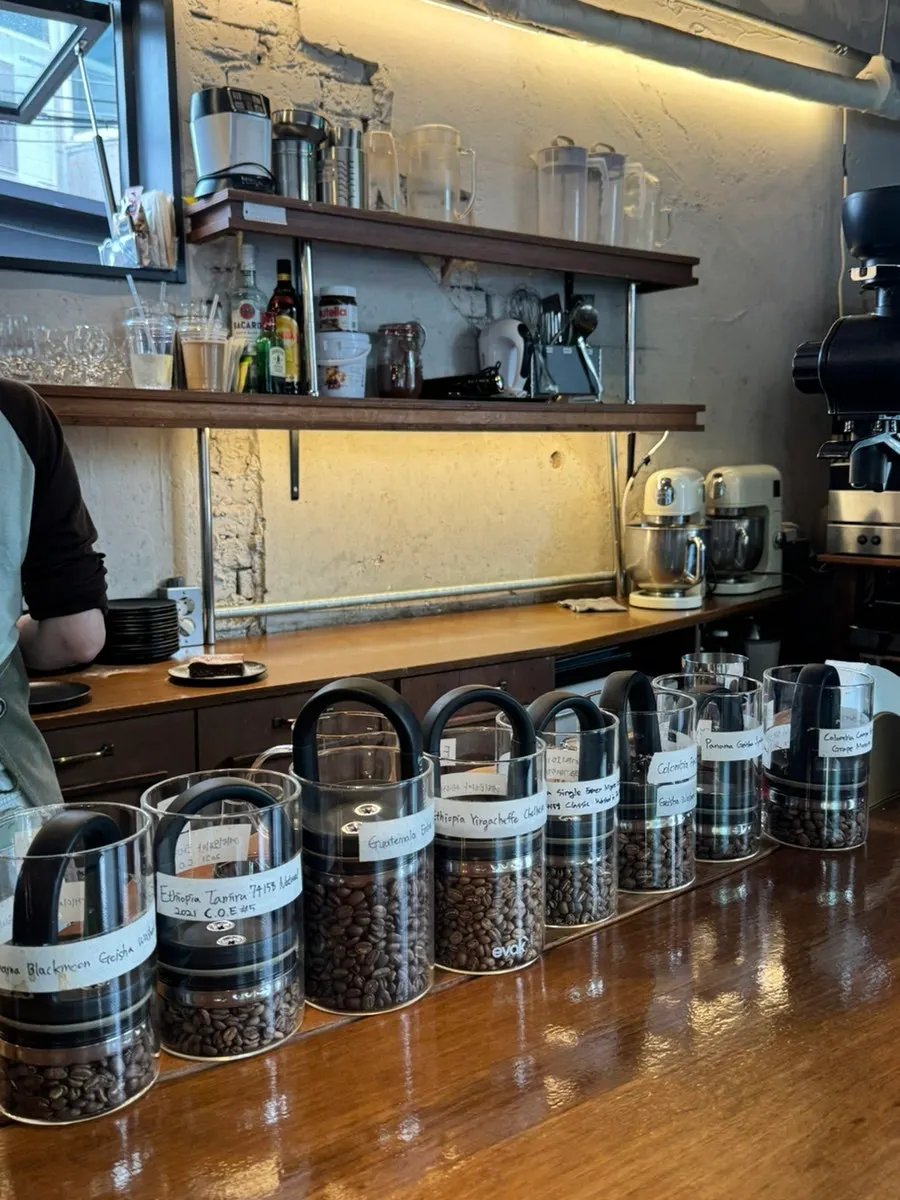 Hand-drip coffee being brewed at the bar