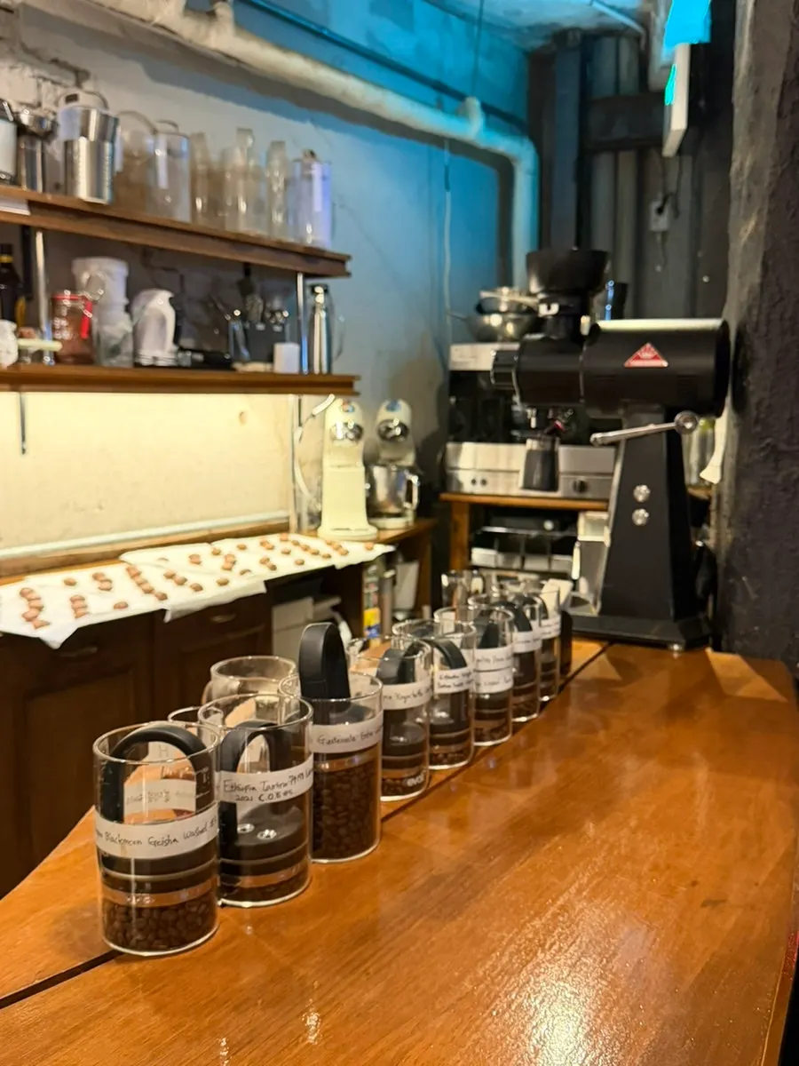 Staff preparing drip coffee at the 1st-floor bar