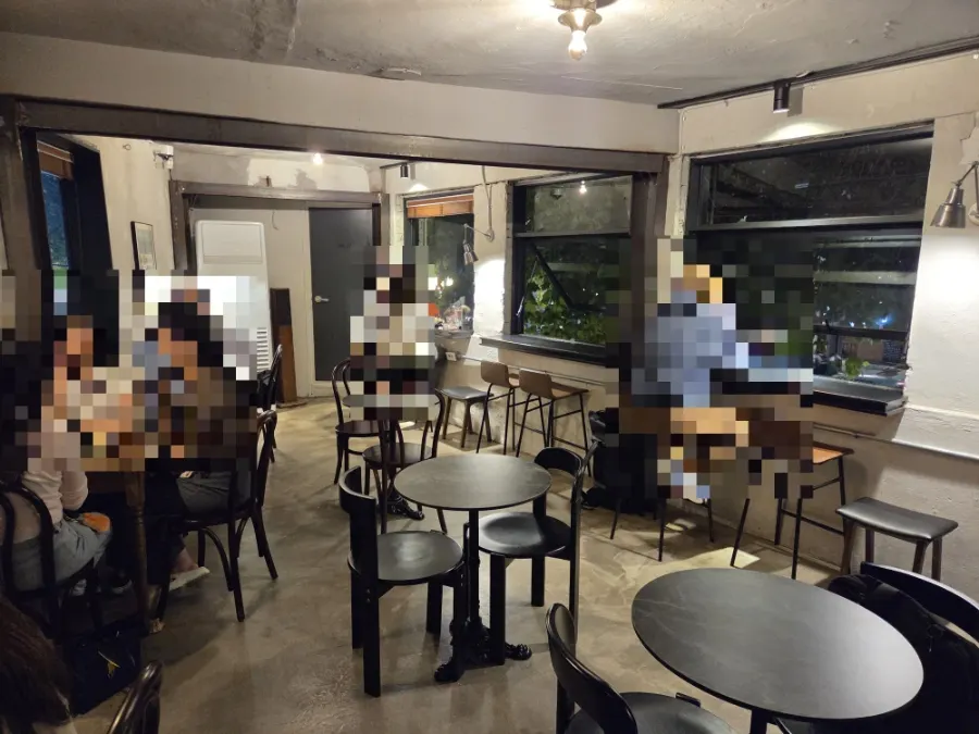 Second-floor window seats, busy with customers