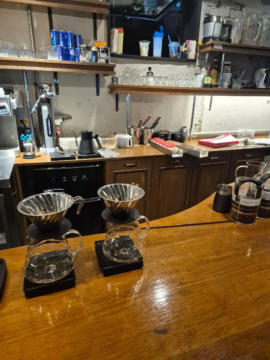 Hand-drip extraction seen from the bar seats