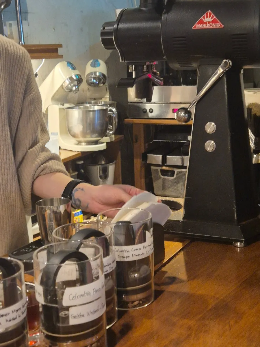 Pouring water over the dripper during hand-drip process
