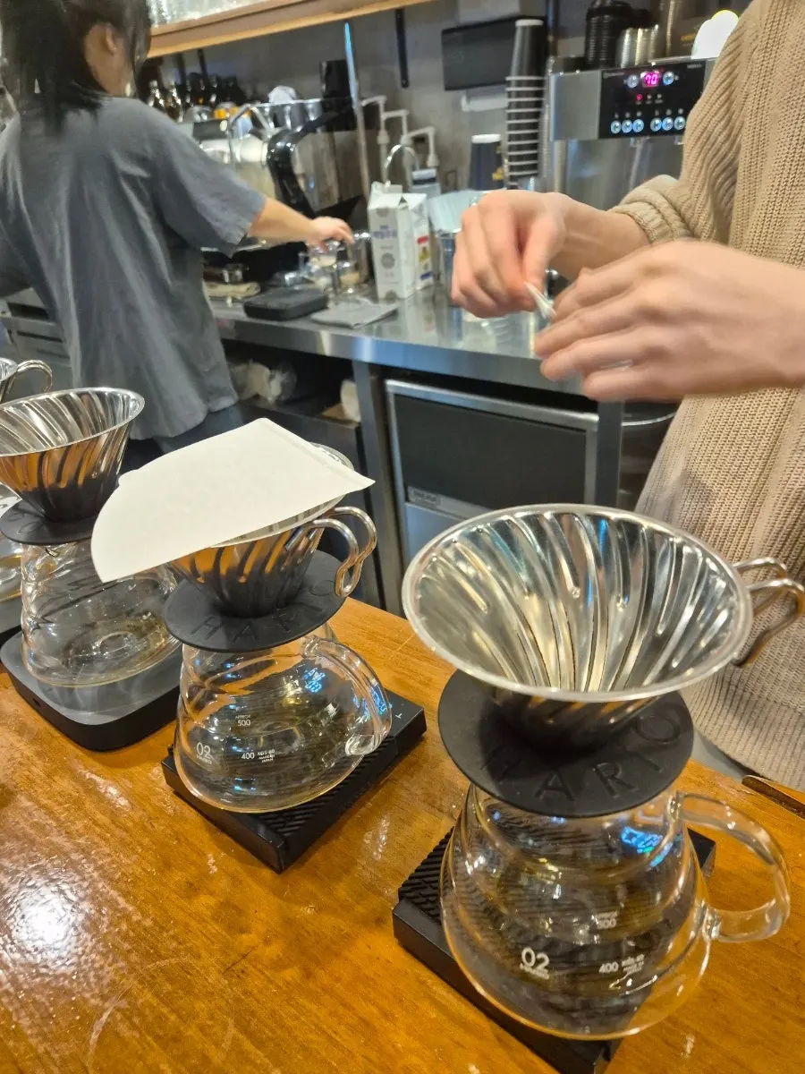 Beans and extraction tools placed on the bar
