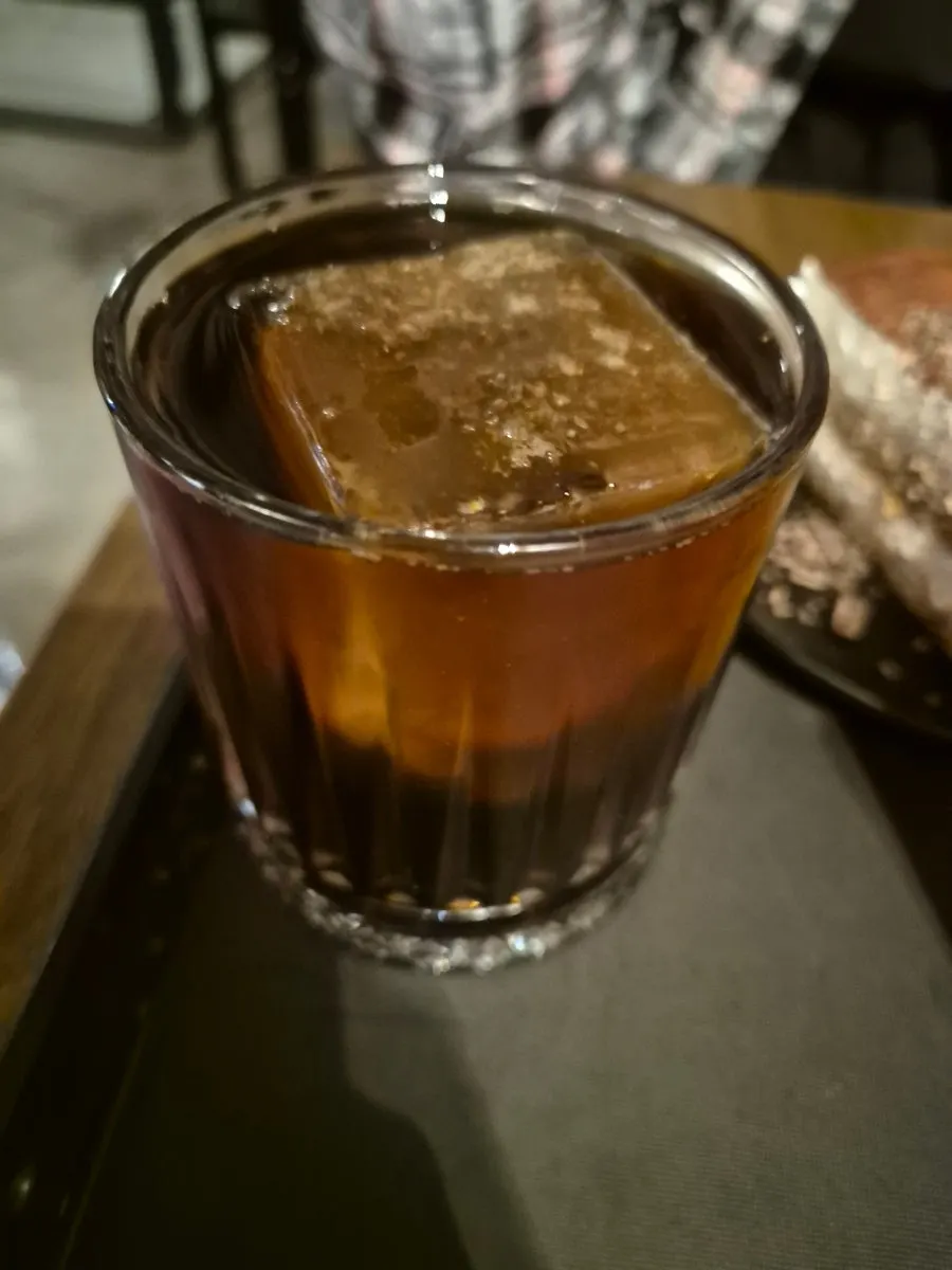 Iced hand-drip coffee with a large ice cube