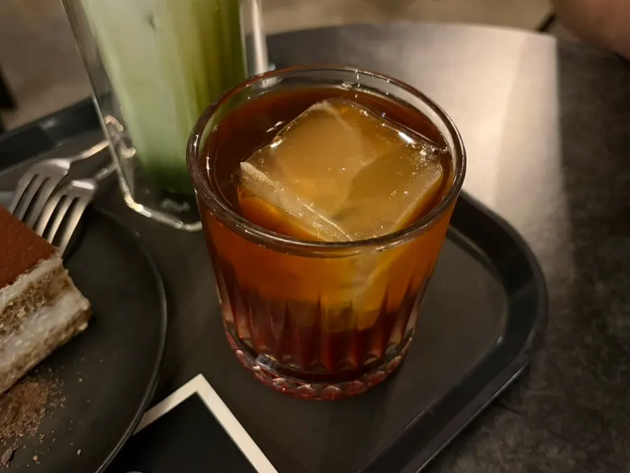 Iced hand drip with a big on-the-rocks-style ice cube