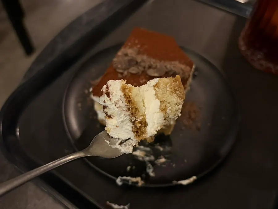 Cross-section of the moist, coffee-soaked tiramisu