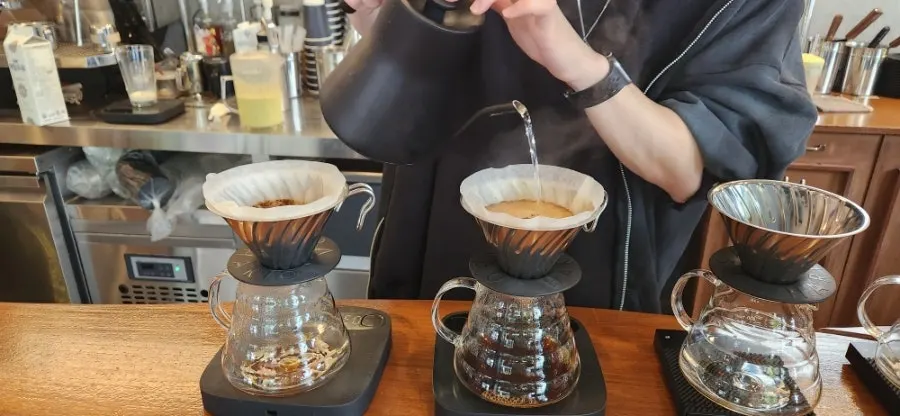Shelf with coffee goods and beans