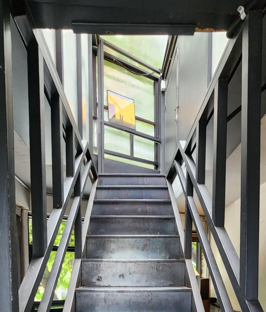 Steel staircase leading up to the 3rd floor