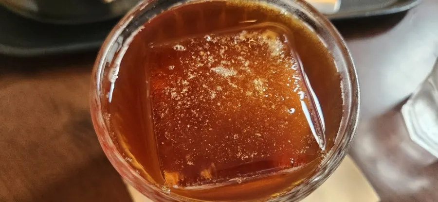 Iced coffee cup photographed in natural light