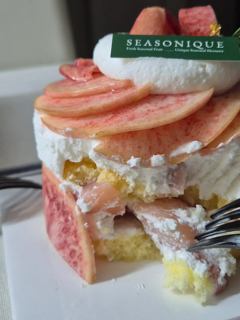 Cross-section showing yogurt whipped cream and peach