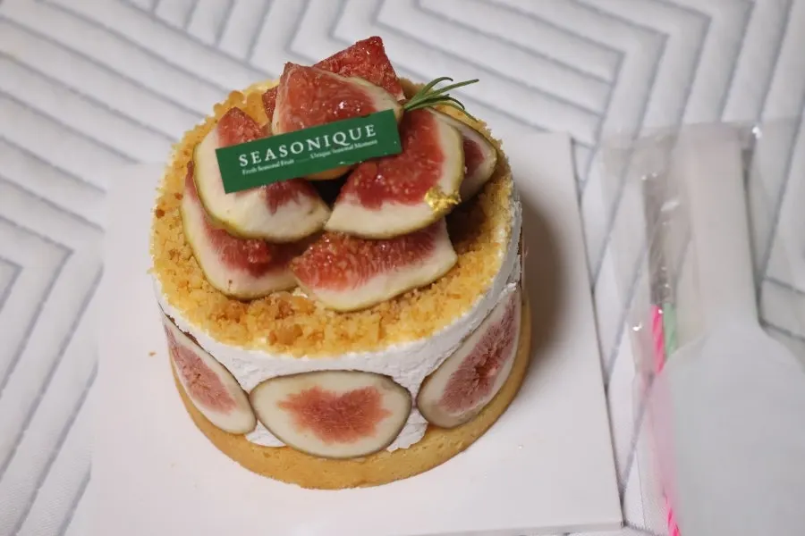 Cake cross-section packed with figs