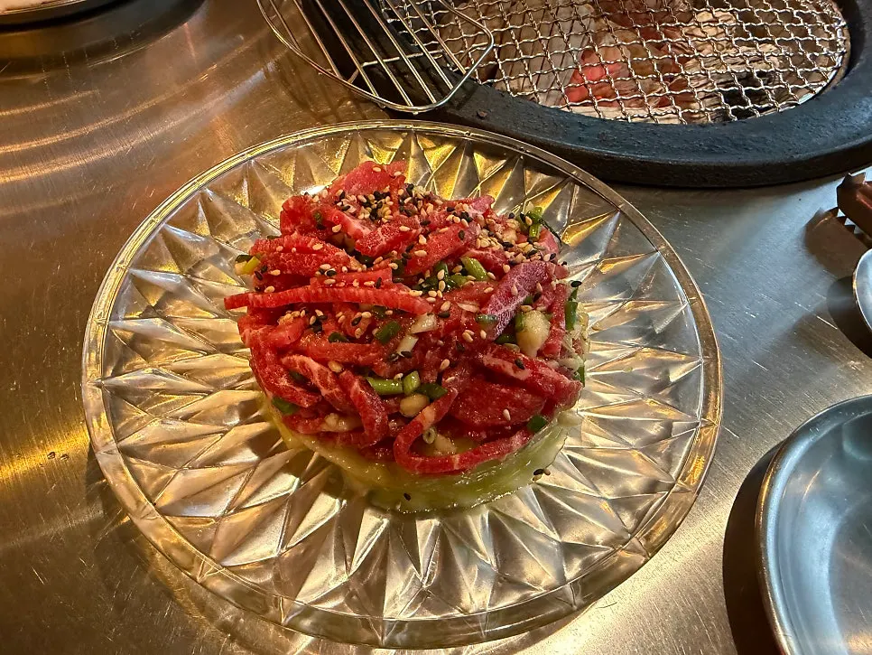 Avocado yukhoe topped with truffle oil