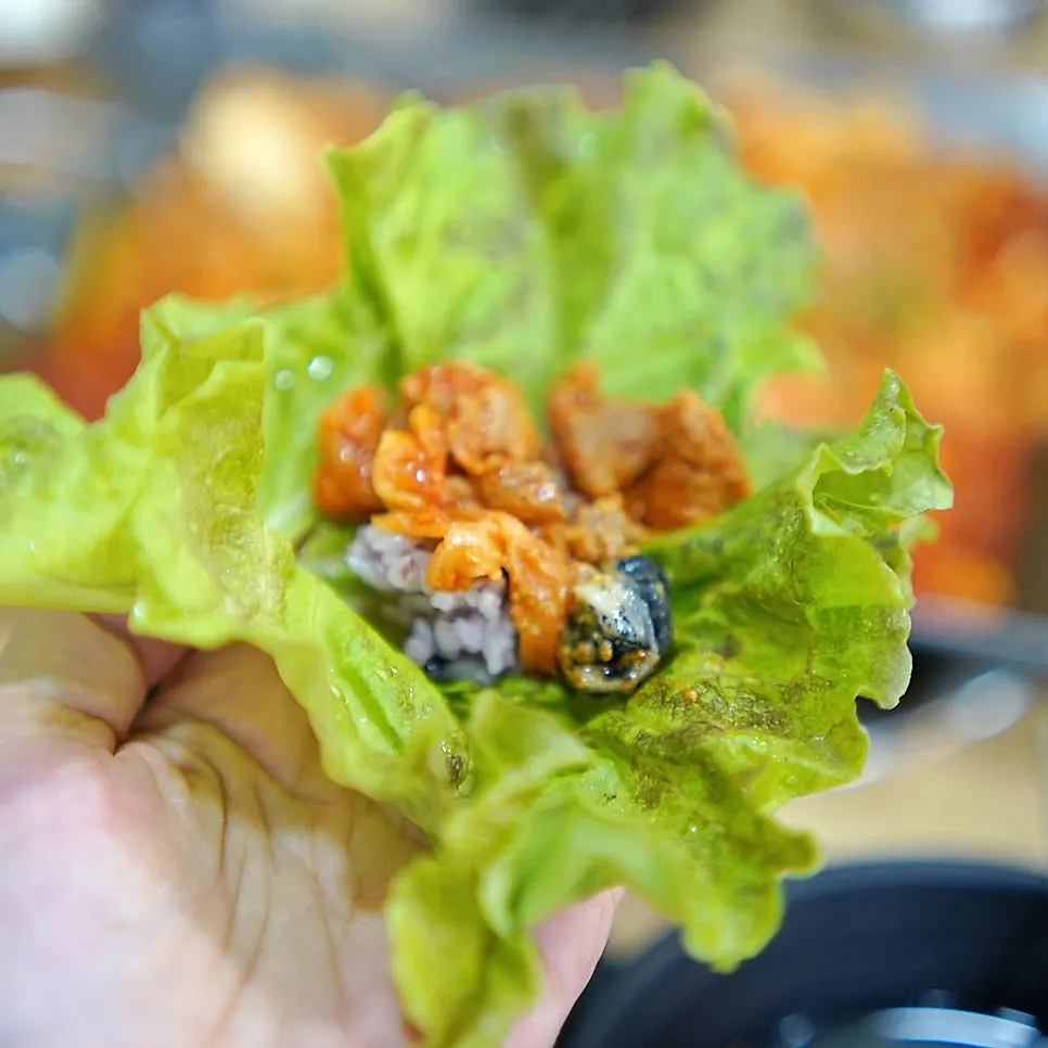 A big wrap topped with ureong ssamjang
