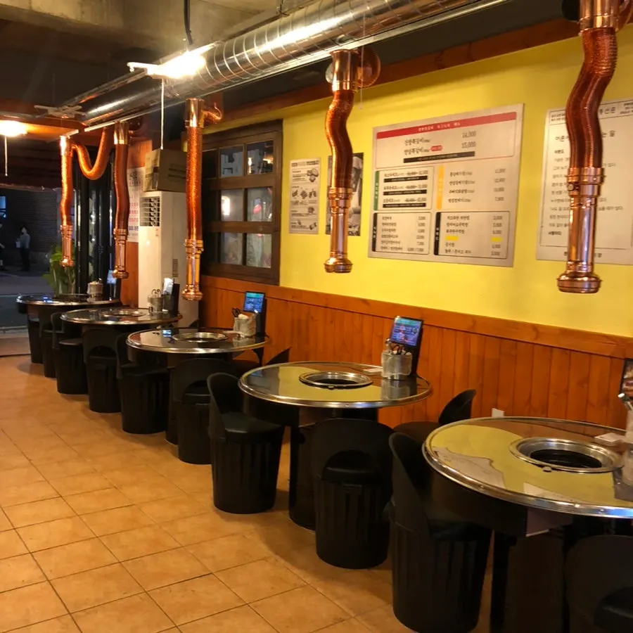 Interior of Champpoppo Jjokgalbi Hapjeong Branch packed with customers