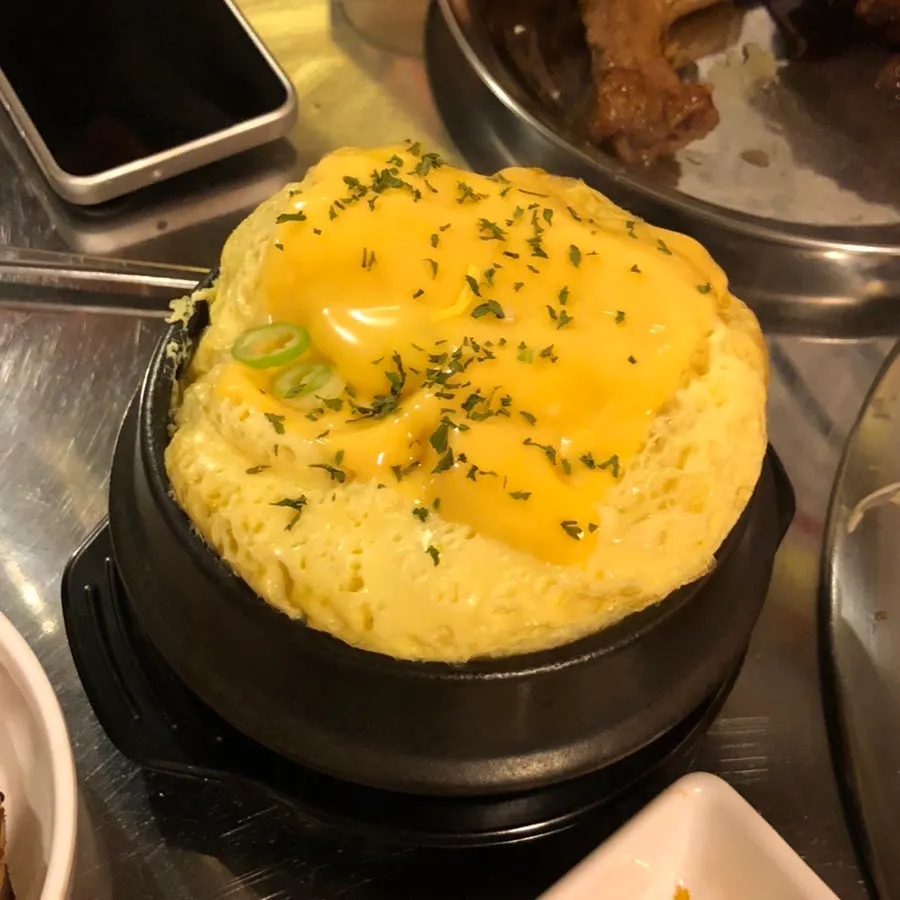 Cheese-bomb steamed egg topped with cheese