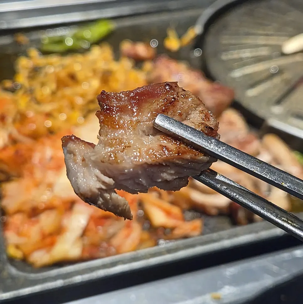 Black pork neck grilling on the plate