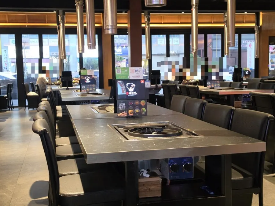 View of the dining hall with multiple tables