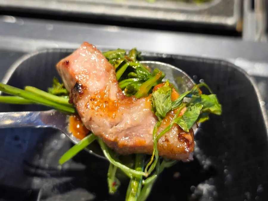 A golden-grilled piece of pork belly